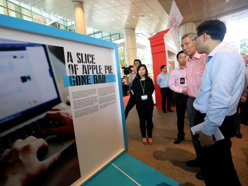 PM Lee at the Declassified — Corruption Matters exhibition at the National Library on Thursday. Mr Lee said despite having a clean system, Singapore cannot permanently
eradicate corruption as it is driven by human nature and greed. Photo: Koh Mui Fong/TODAY