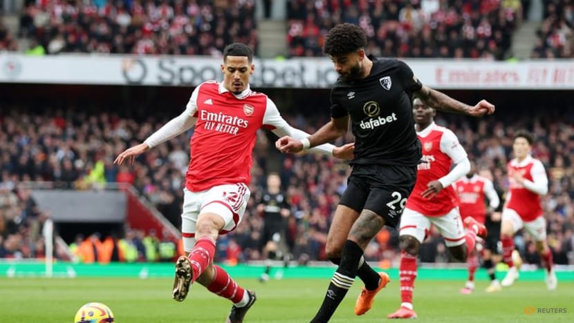 Nelson keeps Arsenal on course in title race with late winner Nelson keeps Arsenal on course in title race with late winner
