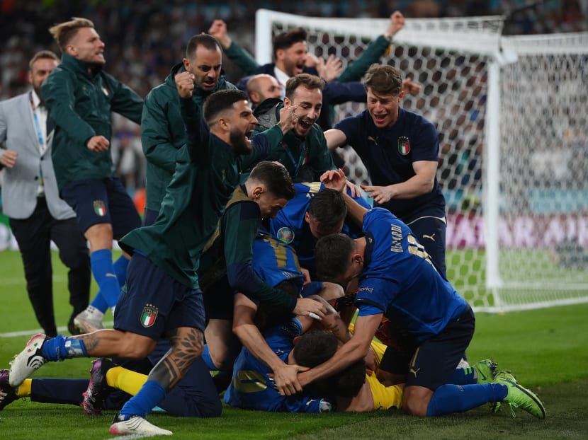 Italy's players celebrate winning the Uefa Euro 2020 final football match between Italy and England at the Wembley Stadium in London, UK on July 11, 2021.