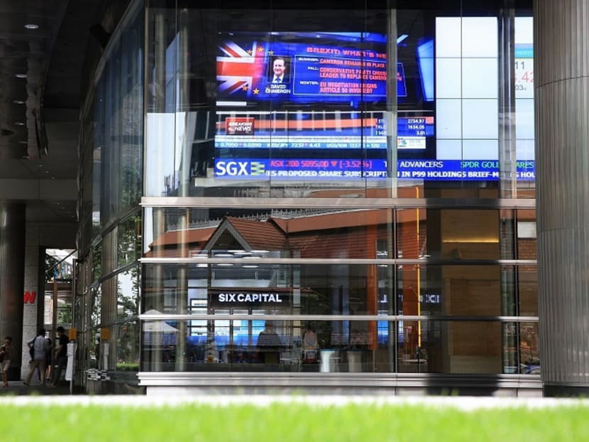 Global financial markets went into a frenzy as Britain voted to leave the European Union, with more than US$2 trillion (S$2.7 trillion) wiped off the value of stocks worldwide, while the pound fell to record lows. Photo: Koh Mui Fong/TODAY