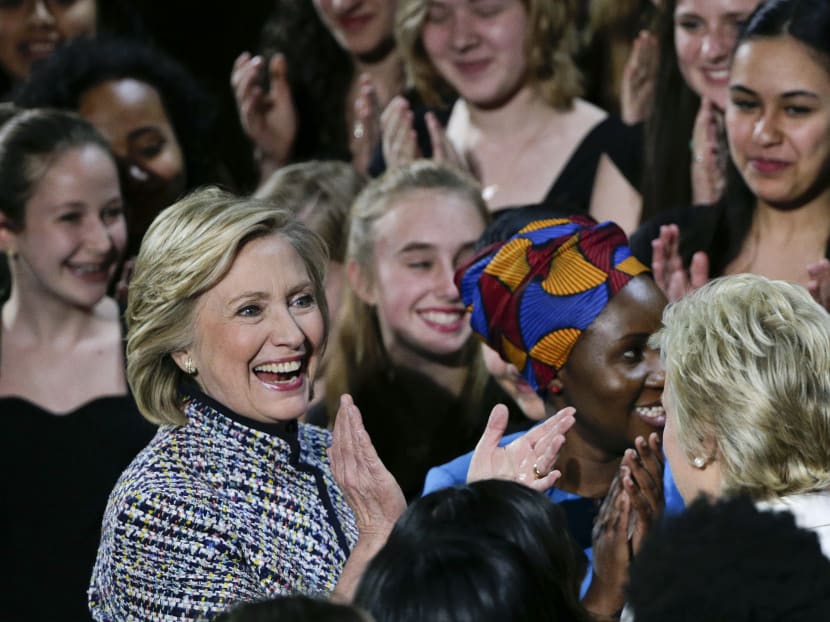 Clinton gives glimpse of how she plans to run as a woman