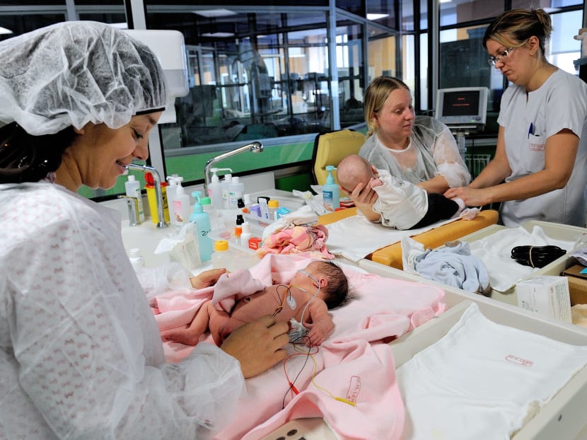 Young mothers care for their premature babies in the neonatal ward of the Centre Hospitalier de Lens in Lens, northern France. AFP file photo