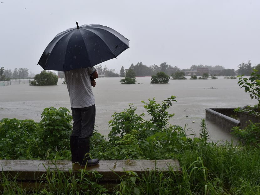 Gallery: Heavy flooding in China leaves 181 dead or missing