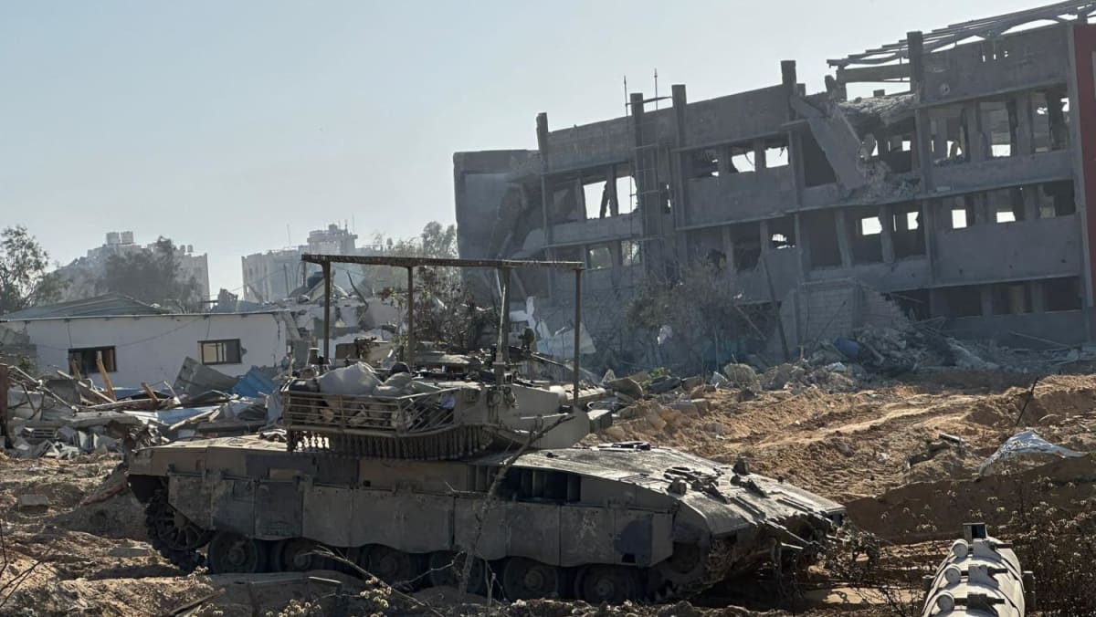 One month on, Israel says forces 'in the heart of Gaza City'