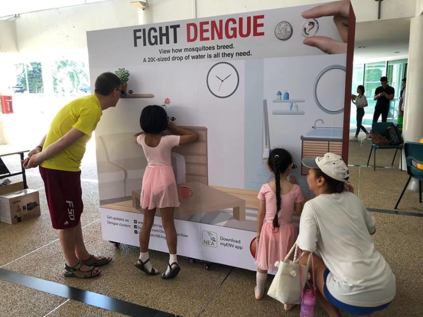 Residents in Singapore's south-east district viewing videos and learning about the life cycle of the Aedes mosquito at the launch of the National Dengue Prevention Campaign 2019 on April 7.
