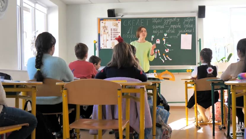 At this Ukrainian school, students not only bring their books, they also carry emergency bags At this Ukrainian school, students not only bring their books, they also carry emergency bags