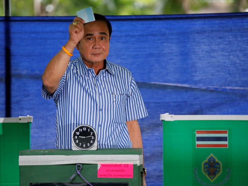 Thai Prime Minister Prayuth Chan-ocha casts his ballot at a polling station during the 2016 constitutional referendum vote in Bangkok, Thailand.