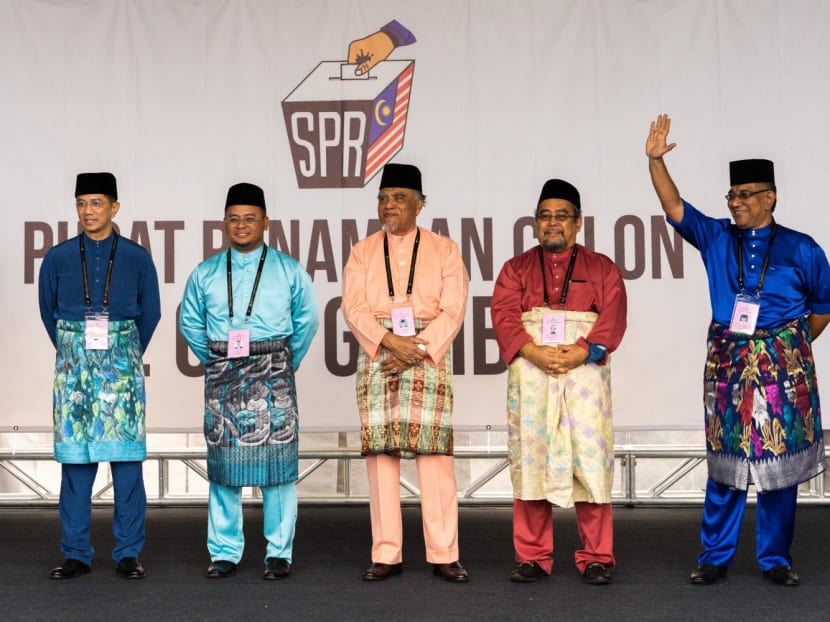 Candidates pose for a photograph at the nomination center in SMK Sungai Pusu Gombak, Selangor, Malaysia on Nov 5, 2022.
