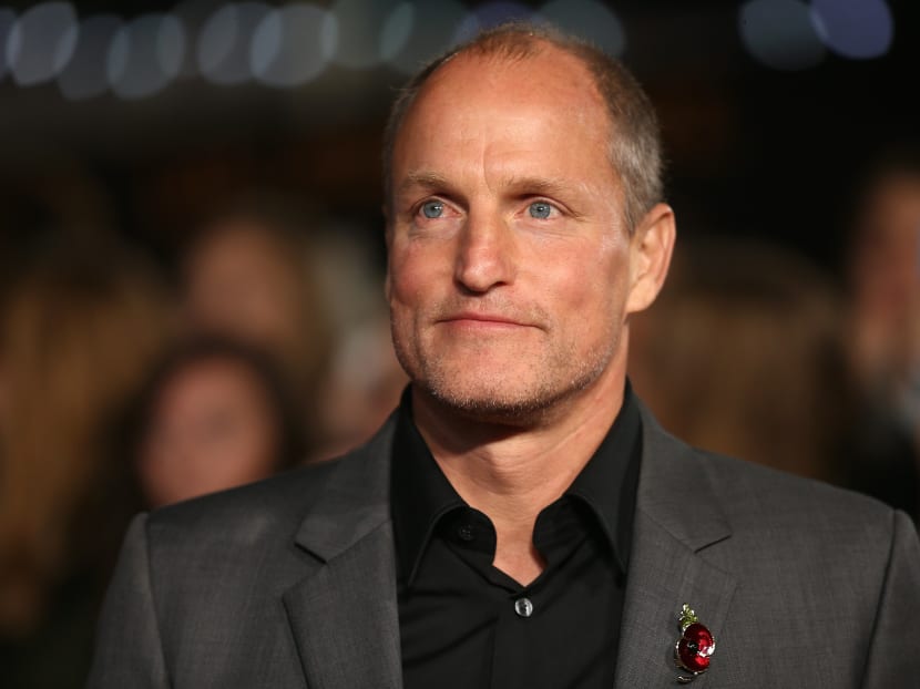 US actor Woody Harrelson arrives on the red carpet to attend the UK Premiere of the film "The Hunger Games: Mockingjay Part 2" in central London on Nov 5, 2015.  Photo: AFP