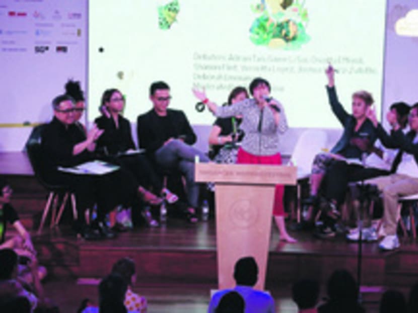From left: Adrian Tan, Deborah Emmanuel, Vernetta Lopez, Joshua Ip, Petrina Kow, Oniatta Effendi, Hirzi Zulkflie, Shamini Flint, and Gwee Li Sui at one of the debates held during the Singapore Writers Festival this year.