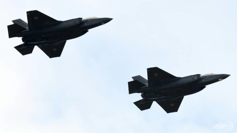 Japan government approves 8th straight defence spending hike to record high Japan government approves 8th straight defence spending hike to record high