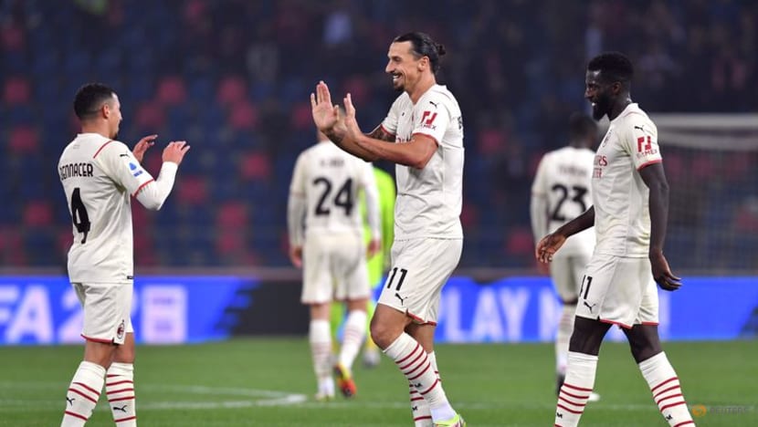 Ibrahimovic scores at both ends as Milan beat nine-man Bologna to go top Ibrahimovic scores at both ends as Milan beat nine-man Bologna to go top