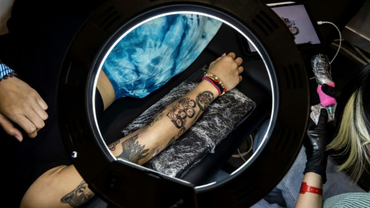 Tattoo artists make their mark at Hong Kong fair Tattoo artists make their mark at Hong Kong fair
