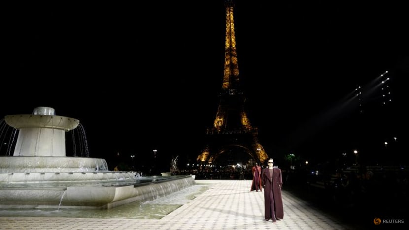 Saint Laurent heats up Eiffel Tower runway with sizzling Parisian glamour