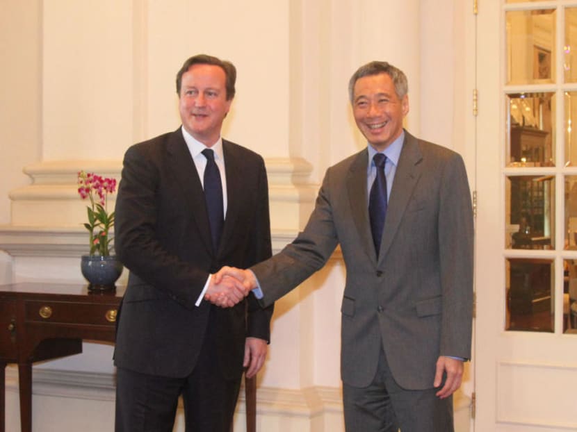 UK Prime Minister David Cameron (left) and Singapore Prime Minister Lee Hsien Loong exchange a handshake after a meeting at the Istana on April 13, 2012. TODAY file photo