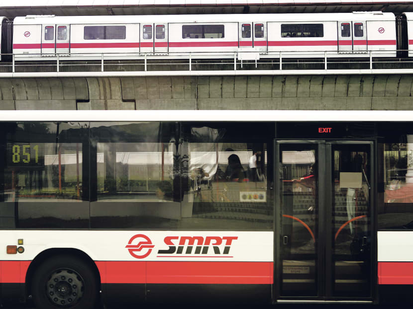 An SMRT bus and train in Singapore. Photo: OOI BOON KEONG