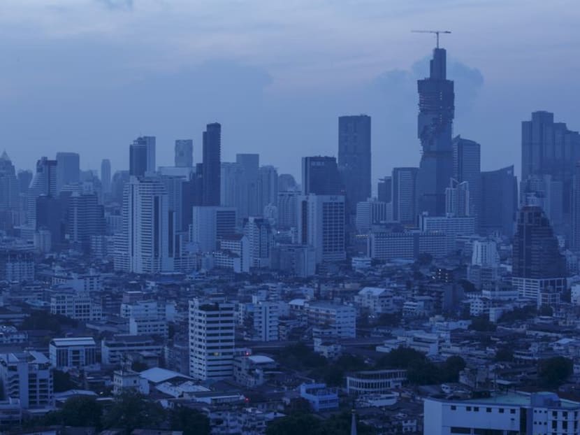 FILE PHOTO: The skyline of central Bangkok is seen before sunrise in Bangkok April 22, 2015. REUTERS/Athit Perawongmetha FILE PHOTO: The skyline of central Bangkok is seen before sunrise in Bangkok April 22, 2015. REUTERS/Athit Perawongmetha