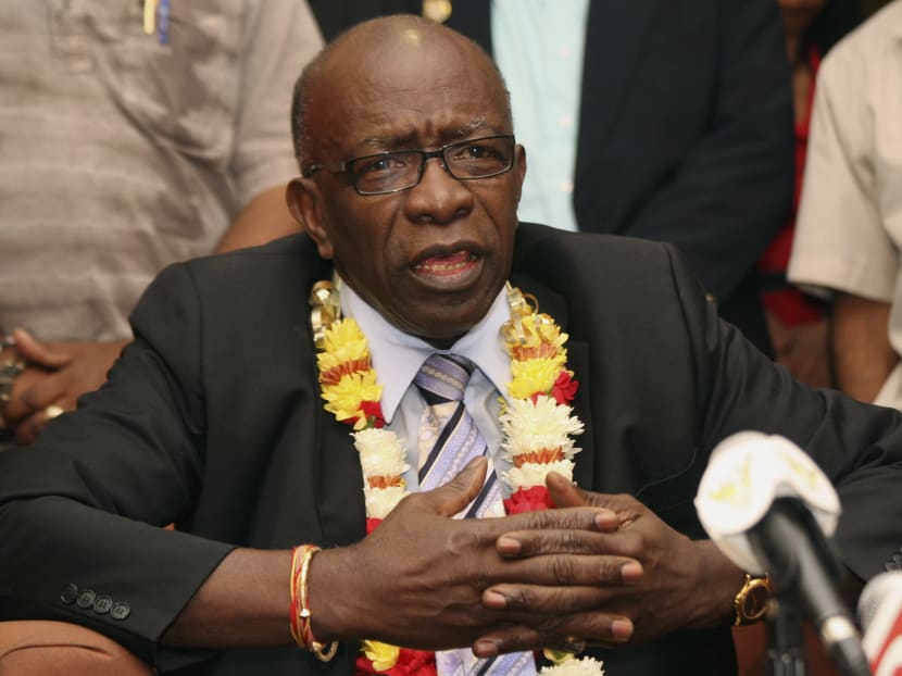 In this June 2, 2011 file photo, suspended FIFA executive Jack Warner gestures during a news conference held shortly after his arrival at the airport in Port-of-Spain, in his native Trinidad and Tobago. Photo: AP