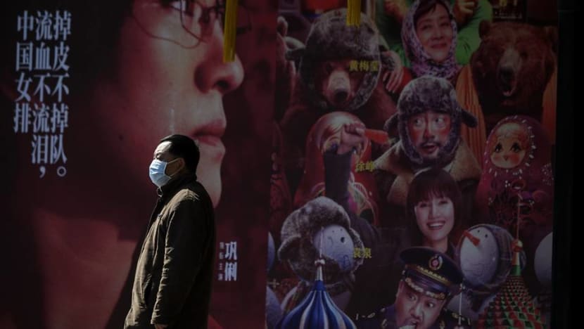 China reports drop in coronavirus cases, but scientists warn virus may spread easily China reports drop in coronavirus cases, but scientists warn virus may spread easily