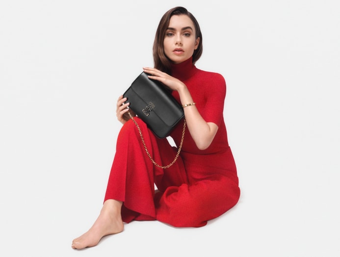 PPREPORT Lily Collins from Emily in Paris was spotted carrying her  personalized My Pliage Signature bag from Longchamp. Explore more on…
