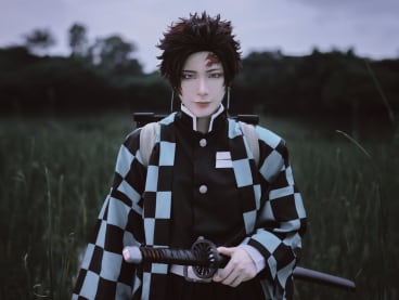 Cosplayer Maoru dressed up as anime character Tanjiro Kamado from Demon Slayer: Kimetsu no Yaiba.