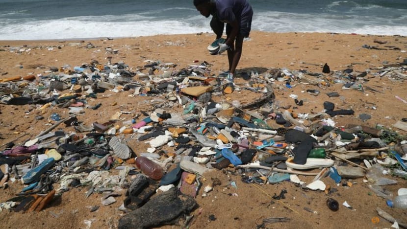 Ivorian artist turns discarded flip-flops from beach into masterpieces Ivorian artist turns discarded flip-flops from beach into masterpieces