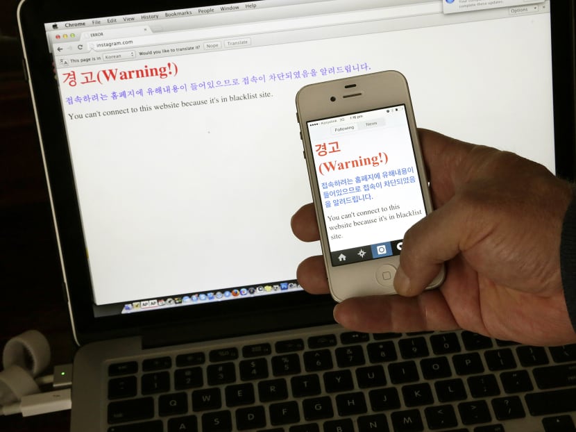 In this, June 20, 2015, photo, a notification saying, "Warning! You can't connect to this website because it's in blacklist site" is seen on both a computer screen and on a smartphone screen in Pyongyang, North Korea. Photo: AP