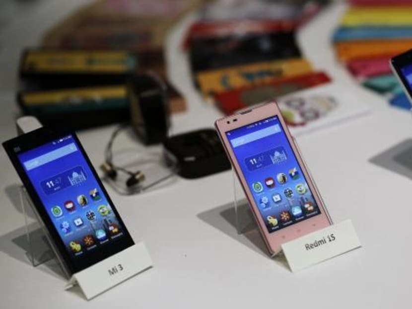 Three models of China's Xiaomi Mi phones are pictured during their launch in New Delhi in this July 15, 2014 file photo. Photo: Reuters