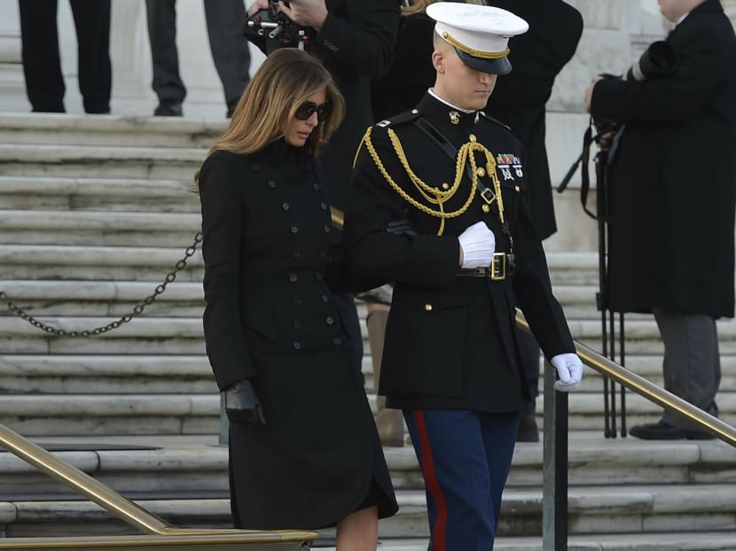 Mrs Melania Trump wallking down the steps during a wreath laying ceremony with US President-elect Donald Trump and Vice President-elect Mike Pence at Arlington National Cemetery in Arlington, Virginia on Jan 19, 2017. Photo: AFP