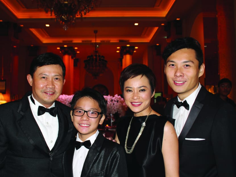 Ilo Ilo stars Chen Tianwen and Yeo Yann Yann with director Anthony Chen (far right).