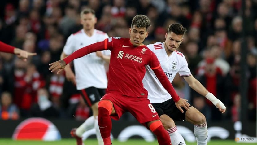 Firmino fires Liverpool into semis despite Benfica rally Firmino fires Liverpool into semis despite Benfica rally