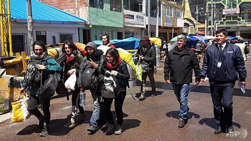Machu Picchu damage tourists deported, banned for 15 years Machu Picchu damage tourists deported, banned for 15 years