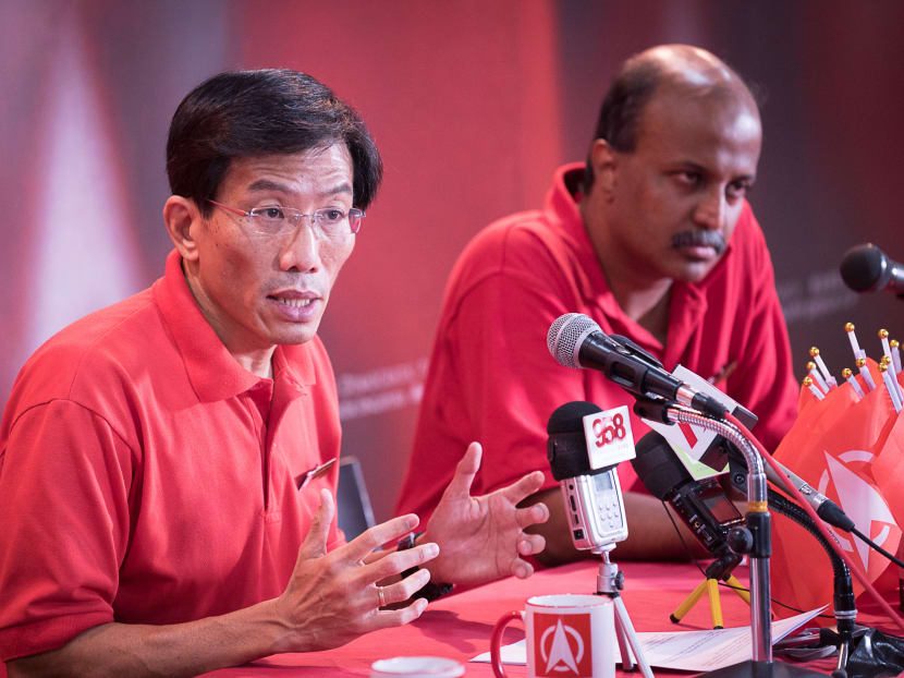 SDP candidates Chee Soon Juan (left) and Paul Tambyah, contesting for Holland-Bukit Timah GRC, speaks at the press conference to address Dr Vivian Balakrishnan's statement on the party's policies. Photo: Ray Chua