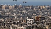 Palestinians drown reaching air drops, as Israel says truce talks at 'dead end'