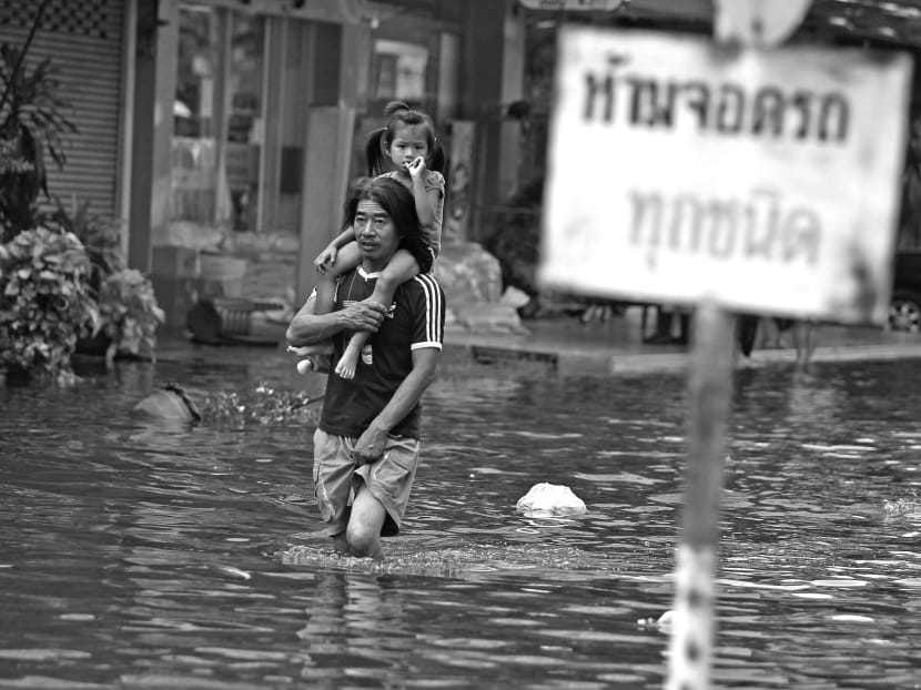 The flood in Bangkok in 2011 was estimated to have cost Thailand S$21 billion and economists say it would take much more than that for recovery. Photo: Sion Touhig