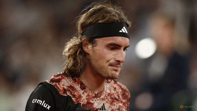Top seed Alcaraz hunts down Tsitsipas to set up Djokovic showdown