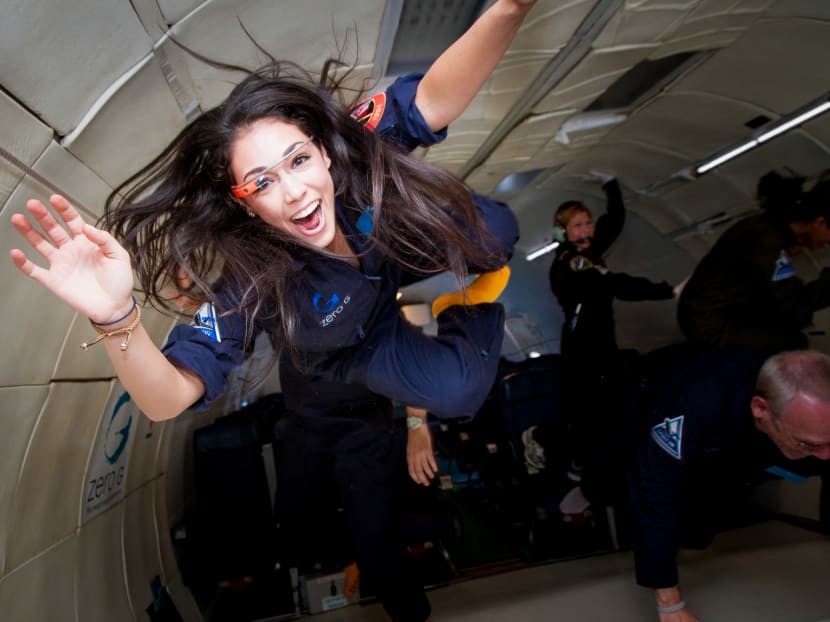 In this undated handout photo provided by Virgin Galactic to AFP on June 3, 2021, researcher for the International Institute for Astronautical Sciences, Ms Kellie Gerardi, experiances weightlessness on a Zero Gravity plane.