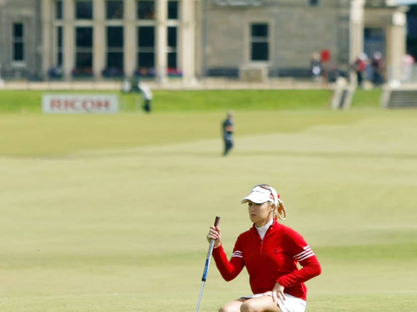 Natalie Gulbis of the US at The Royal and Ancient Golf Club in St Andrews, Scotland. About 85% of members supported the move to allow women to become members. PHOTO: AP