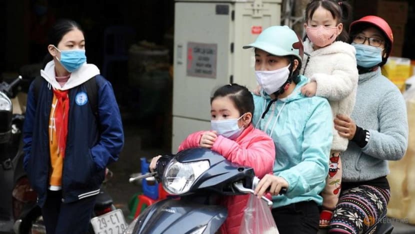 Vietnam sets COVID-19 vaccination targets as new curbs kick in
