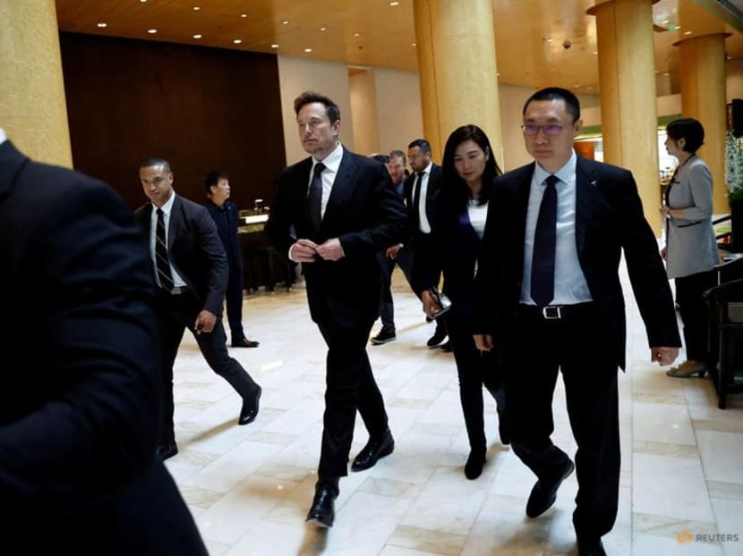 FILE PHOTO: Tesla Chief Executive Officer Elon Musk leaves a hotel in Beijing, China May 31, 2023. REUTERS/Tingshu Wang/File Photo
