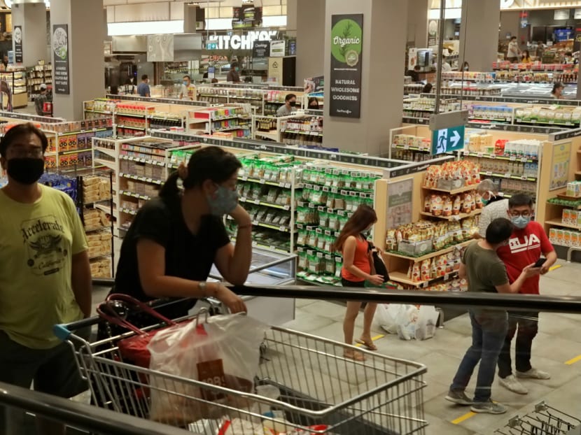 According to a Telegram and WhatsApp message sent out by the Government on Thursday morning, those intending to visit supermarkets, shopping malls or wet markets should bring their NRIC or other official photo identification with a barcode for scanning, such as a driving licence.