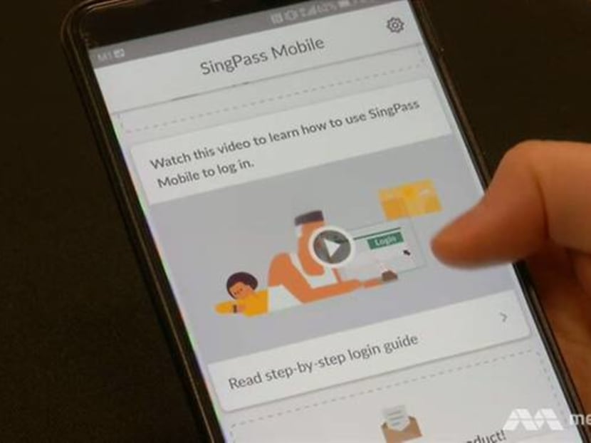 A user exploring the SingPass Mobile app on his smartphone.