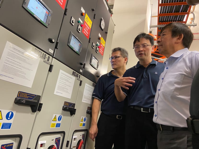 Transport Minister Khaw Boon Wan looks at the recently renewed power systems at Bukit Batok MRT Station.