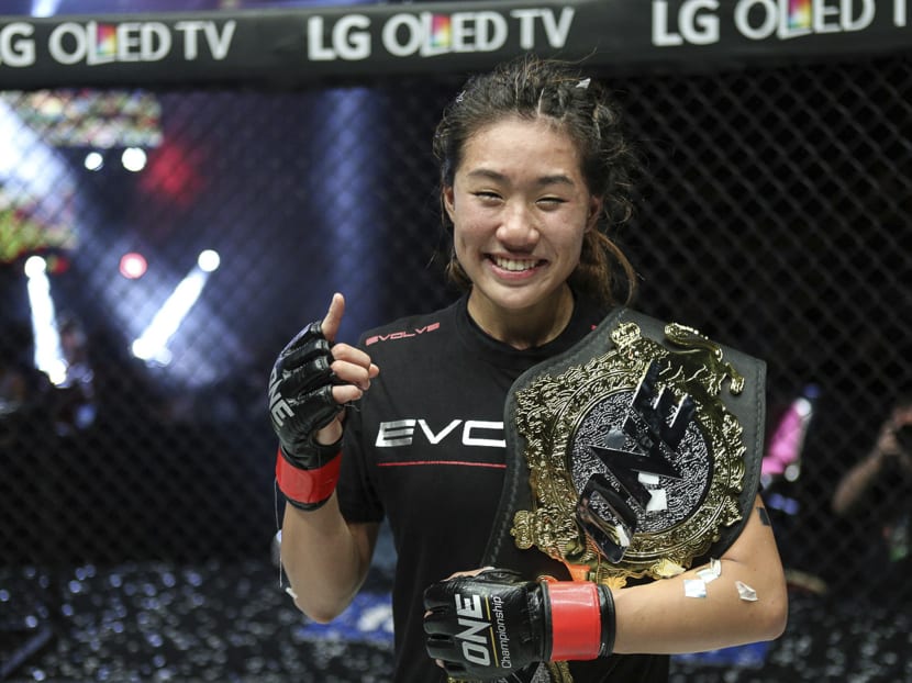 Angela Lee with the women'a atomweight belt. Her fight in Bangkok will be her first title defence. Photo: AP
