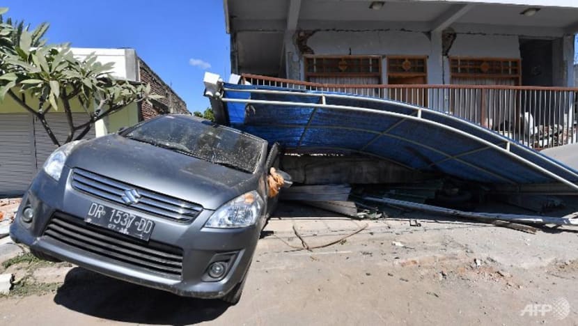 Woman rescued from rubble of deadly quake on Indonesia's Lombok Woman rescued from rubble of deadly quake on Indonesia's Lombok