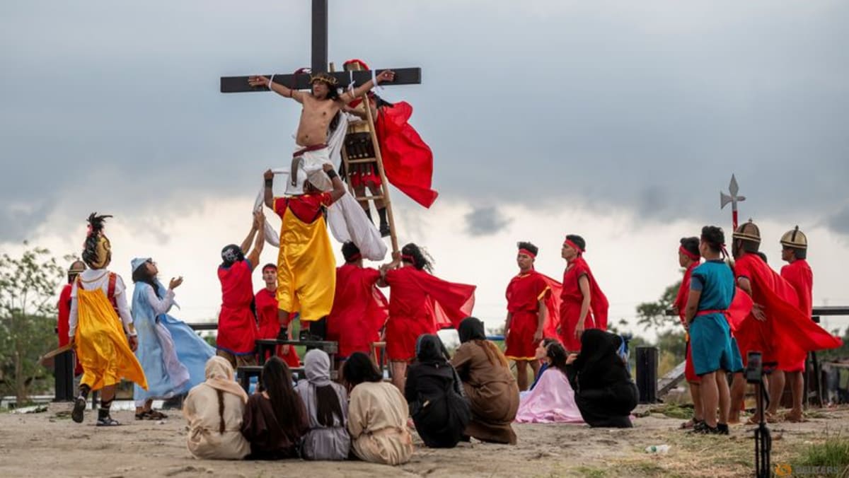 Philippines’ Catholic devotees nailed to crosses to re-enact crucifixion