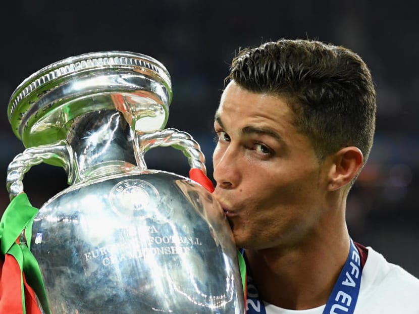 Portugal skipper Cristiano Ronaldo kissing the European Championships trophy that he has been waiting 12 years to win. Photo: Getty Images