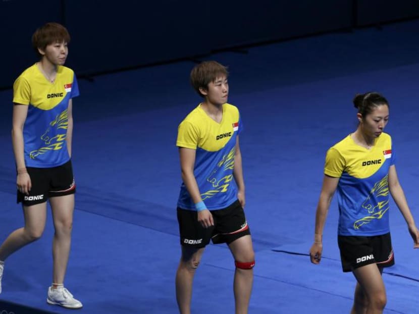 The Singapore women's table tennis team - (from left) Zhou Yihan, Feng Tianwei and Yu Mengyu - have been plagued by conflict and coaching shake-ups for the past 10 months. Photo: Reuters