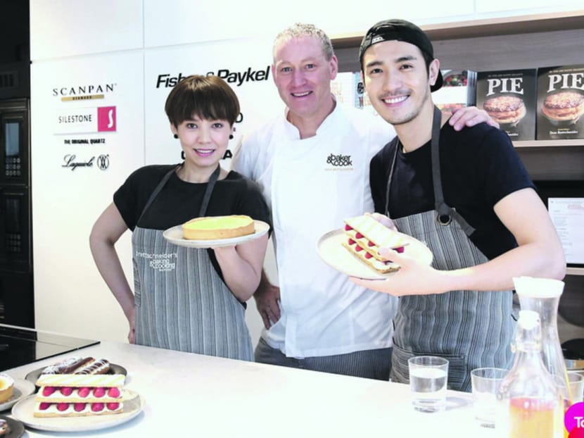 Kit Chan, Dean Brettschneider and Chris Lee with their favourite creations of the day. Chan and Lee had to take a six-hour training session to prepare for their roles in Toggle's Patisserie Fighting. Photo: Lee Wei Lin/Toggle
