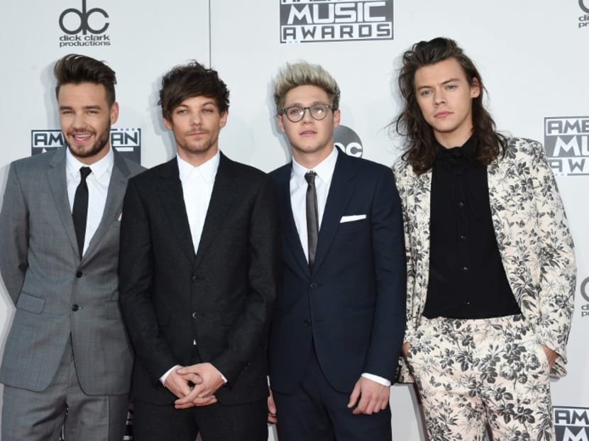 (From left) Liam Payne, Louis Tomlinson, Niall Horan, and Harry Styles of One Direction attending the 2015 American Music Awards at the Microsoft Theater at L.A. Live in Los Angeles. Tomlinson has become a father, reports said January 22, 2016, weeks after the British boy band went on hiatus. Photo: AFP
